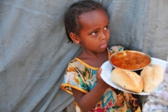 She is delivering food to someone.