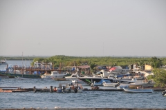 As we get closer to the city of Banjul we see more fishing boats.