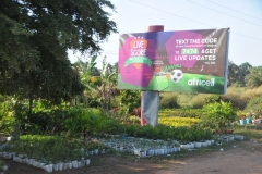 Notice a nursery with pots under the sign advertising sports results above.  All you need is a phone.