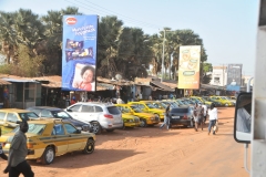 Lots of used car locations in the outskirts of the city.