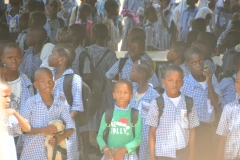 Kids started pouring out of classrooms everywhere to see the strangers at the end of the class day.