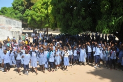 Each of these photos is of a different group of students waving goodbye.