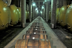 Oak Barrels lie on their side for aging.
