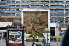 Old Soviet Bloc buildings in the background