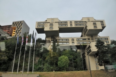 Bank of Georgia Headquarters built in 1975.  .The structure consists of interlocking concrete forms. Two-storey horizontal parts are placed on top of each other in the form of a grid. This 18-story building cannot be left out of sight and has never been.