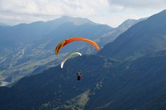 2 separate paragliders in the same photo