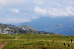 Para gliders to the left and the right in the photo.