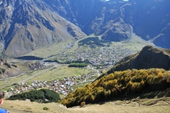 Looking down from Gergeti Trinity Church into valley and the village of Kazbegi.