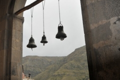 Outside the chapel  bells to ring in the wind