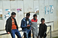 Young guys hanging out. Jobs are scarce for the youth in smaller towns.