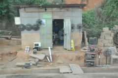 Another case where the road was built much lower than the building already there. Quite a step down.