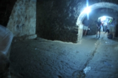 We walked in and through holding rooms to the door of "No Return".  Many died in confinement. These rooms were filled to capacity with men in them. There were separate holding areas for women.