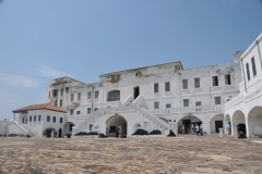 Portuguese and British gathered and imprisoned the enslaved at forts on the African coast and then brought them to the Americas, mainly in the Caribbean.  This is the large outdoor area looking back at the Cape Coast Castle and its many rooms.