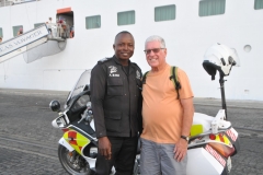 Photo of our Police Escort and myself.  He did an awesome job escorting us and directing traffic for our buses.