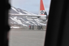 A US Coast Guard  Lockheed Martin aircraft landed at Kulusuk the same when we arrived. Here the crew is returning to the aircraft. .