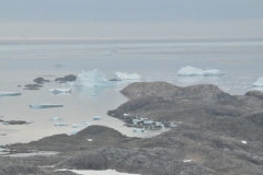 Our helicopter ride this afternoon takes us to Angmagssalik Island at the mouth of the Angmssalik Fjord and landing in Tasiilaq..  We have incredible views of the ice filled sea below.