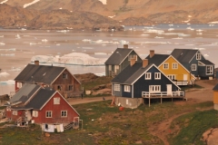 Large  chunks of  icebergs have floated only yards from the homes near the harbor.