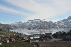 View from the hotel was spectacular looking across the bay with the snow on the mountains, the Ice Bergs floating in the harbor with the homes of locals just in front of us.  It is the  first time we have seen blue sky and sun since arriving in Greenland.