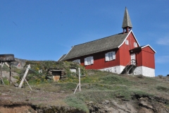 Ammassalik Museum is a small local museum consisting of a cultural history museum housed in the old church of the city. Below the church, in a basement,  is the Photo Museum, where art and modern exhibitions are exhibited,  There is also access to a smaller library with the museum's book collection. In addition to the two main buildings, the museum has the Chapel and the Turf house. The turf house is open to visitors, who  can get an insight into the standard of living 140 years ago.