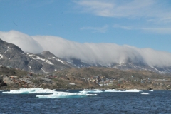 Fog is pouring over the mountains from the North Sea.