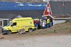 Walking into town I ran across a solemn site.  The ambulance doubles as a hearse for a funeral in front of a small church..