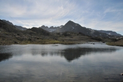 A small beautiful lake of fresh water is located inland walking a short distance.