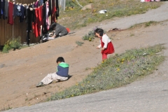 Kids playing in the sunshine.