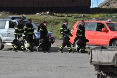 Fire fighters walking to the music close by to check it out.