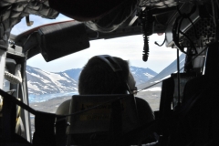 Beautiful sight looking around the pilot inside the helicopter on a sunny afternoon. .
