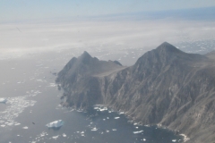 Last look at Greenland's sheer cliffs after taking off for Reykjavik.