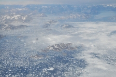 Final  glimpse of the eastern side of Greenland and the North Sea ocean covered with ice.