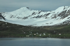 View across the fjords with a view of a few homes