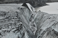 The crevasses can be hundreds of feet down  in length.  These have melted hugely in recent years.
