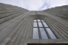 Hallgrimskirkja’s enormous size was also frequently debated; at that time there were few tall buildings in Iceland and the surrounding houses looked tiny compared to this huge church. The church was built during times of inflation and that made financing the construction hard. Disunity about the church’s design didn’t help either. When the church was finally inaugurated in 1986, 65% of the construction costs had been covered by parishioners.   The façade of Hallgrímskirkja is, like several other buildings in Iceland, inspired by columnar basalts. Other elements of the church are also inspired by Icelandic nature, such as volcanoes, geysers and the vast wilderness.