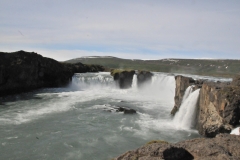 Goðafoss is a waterfall in northern Iceland. It is located along the country's main ring road at the junction with the Sprengisandur highland road. The water of the river Skjálfandafljót falls from a height of 36 feet over a width of 90 feet The river rises in the Icelandic highlands and runs through the Bárdardalur valley.