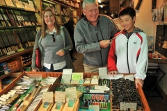 Friends buying a pocket knife in the street market