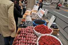 Set up on the street a block away fro the market entrance