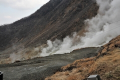 Natural sulfur coming from the ground in Owaku-dani Valley at the top of the mountain area