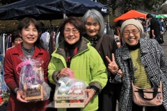 Ladies displaying the items they have made by hand. Beautiful