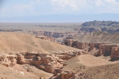 Charyn Canyon National Park is a day trip from Almaty. It is indeed one of the most spectacular places in this region to see the beautiful nature of Kazakhstan. Even though the Charyn Canyon is much smaller than the Grand Canyon in the US, it looks very similar and is equally impressive. The canyon follows the Charyn river for about 30 miles. The walls of the canyon reach up to 900 feet at some point and the colors range from red to brown, yellow and black.