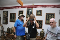 Our local guide in Kyrgyzstan, Artem, demonstrates the art of wearing an antique helmet.