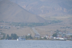Issyk-Kul Lake is 113 miles long, up to 37 miles wide and its area is 2,408 square miles. It is the second largest mountain lake in the world behind Lake Titicaca in South America. It is at an altitude of 5,272 feet and reaches 2,192 ft in depth.