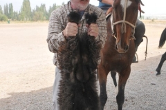 Chuck Coleman from our group lifting the dead goat. The winning group at the end of the day takes the goat home and prepares it for a victory meal.