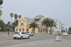 The city is situated at the edge of the Namib Desert and is the fourth largest population center in Namibia. The Namib desert may be the oldest desert in the world and contains some of the world's driest regions.  The Namib stretches for more than 1,200 miles along the Atlantic coasts of Angola, Namibia, and South Africa, extending southward from the Carunjamba River in Angola, through Namibia and to the Olifants River in Western Cape, South Africa.