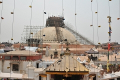 Like Mecca for Muslims the main pilgrimage site for Tibetan Buddhists is Boudhanath Stupa. It stands 118 feet high. Tens of thousands of pilgrims make the journey each year. The temples hemispherical dome represents the emptiness from which everything begins; rising above the dome, the harmika shines the Buddha's eyes in four directions that symbolize his total awareness.