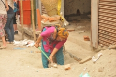 This woman is working very hard in construction
