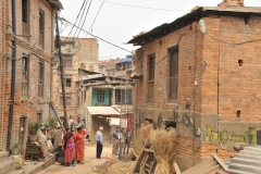 How long do you think the housing building to the left will last in the next earthquake? It is already leaning.