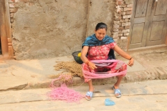 Rolling up yarn.