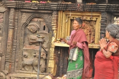 Praying at an alter in the square