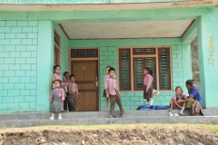 The school is locked up. The teacher has not arrived yet.
